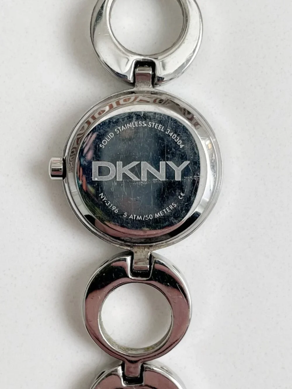 DKNY Women's Bracelet Watch Stainless Steel Circle Links NEEDS BATTERY